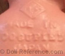 Celluloid doll mark a diamond symbol plus ? Made in Occupied Japan