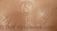 Celluloid doll mark S inside a circle Made in Japan