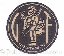 Gustav Forster doll mark GF man smoking pipe with rifle, gun