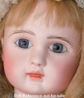 1889 + J Steiner Figure A doll face, 21"