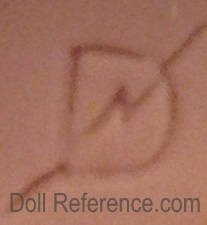 American doll mark DN with line thru