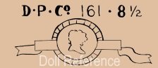 Diamond Pottery Company doll mark DPCo. 161 head on ribbon symbol