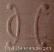 Celluloid doll mark HC intertwined - unknown