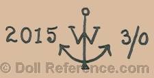 Louis Wolf doll mark W on an anchor symbol