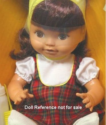 Shindana Little Girl doll plaid dress, mid 1960s