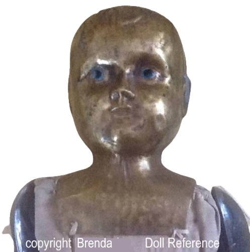 ca. 1921 Atlas Doll & Toy Company Metal Head doll, 12" tall