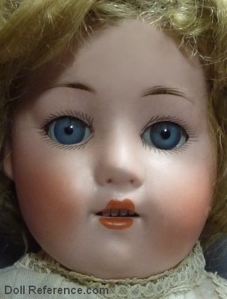 William Goebel Dolly Face 21" tall, doll mold 521, bisque shoulder head, glass eyes, open mouth with teeth, kid body