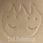 Goebel house of Global Art doll mark 2 smiley faces